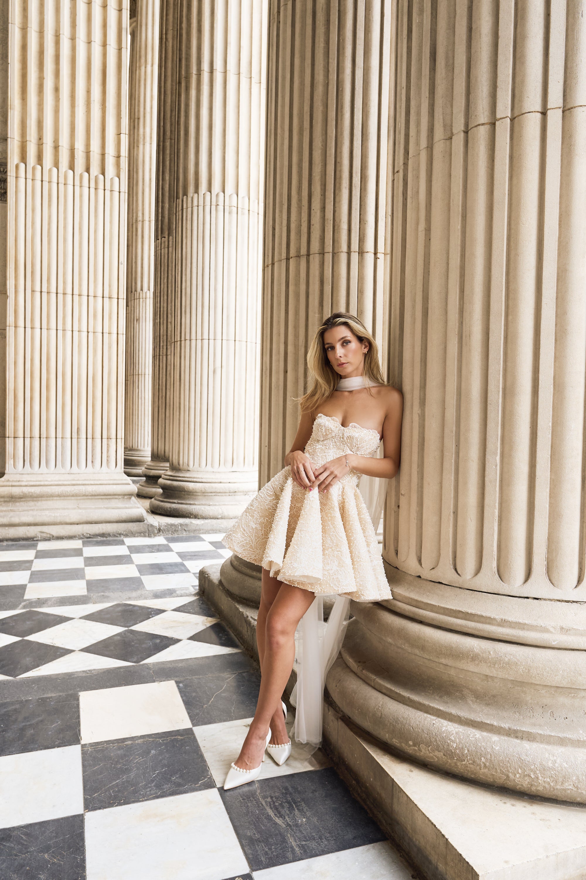 Bride wearing a handmade bespoke short mini wedding dress gown in London St.Paul's Cathedral  – Rebecca Tembo