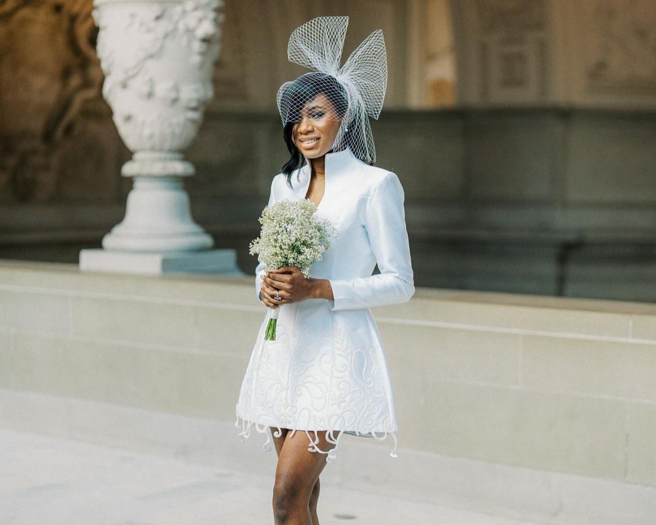 Olakeyede_wears_a_bespoke_Rebecca_Tembo_wedding_dress_from_London_to_America_designer_for_her_civil_wedding.jpg